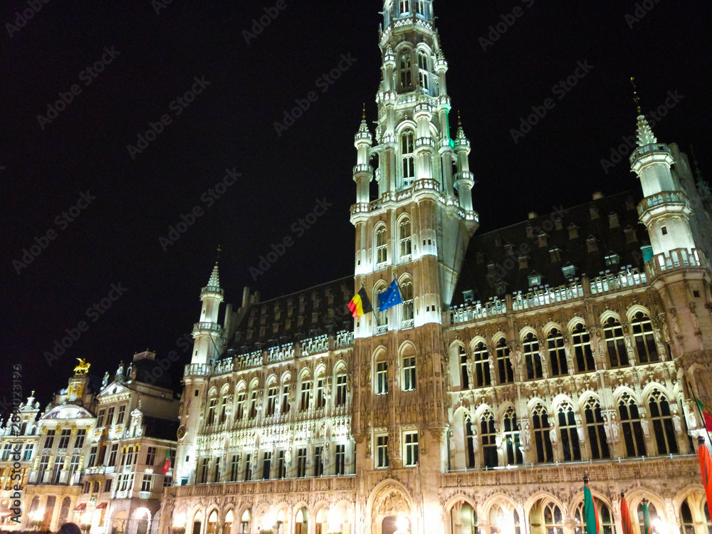 Grand Place (Grote Markt), the main square, in Brussels, Belgium, during the night, with illuminated buildings