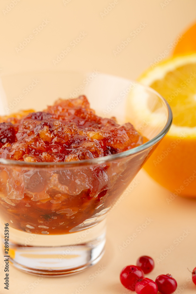 Orange and cranberry jam close-up, winter food
