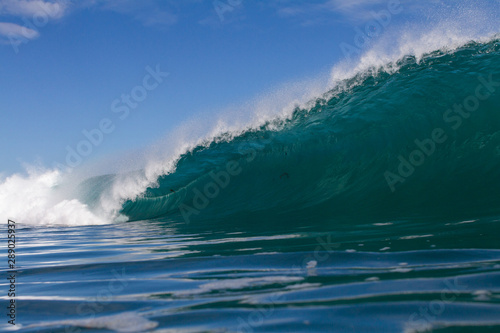 huge wave crashing on the rocks close up © Ryan