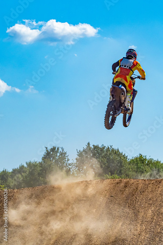 Motocross rider on a trail detail