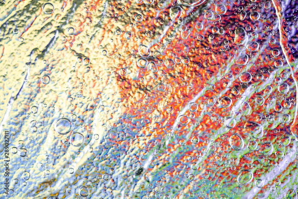 Abstract rainbow color backdrop with oil drops and waves on water surface. 3d Illustration Abstract rainbow color backdrop with oil drops and waves on water surface. 3d Illustration