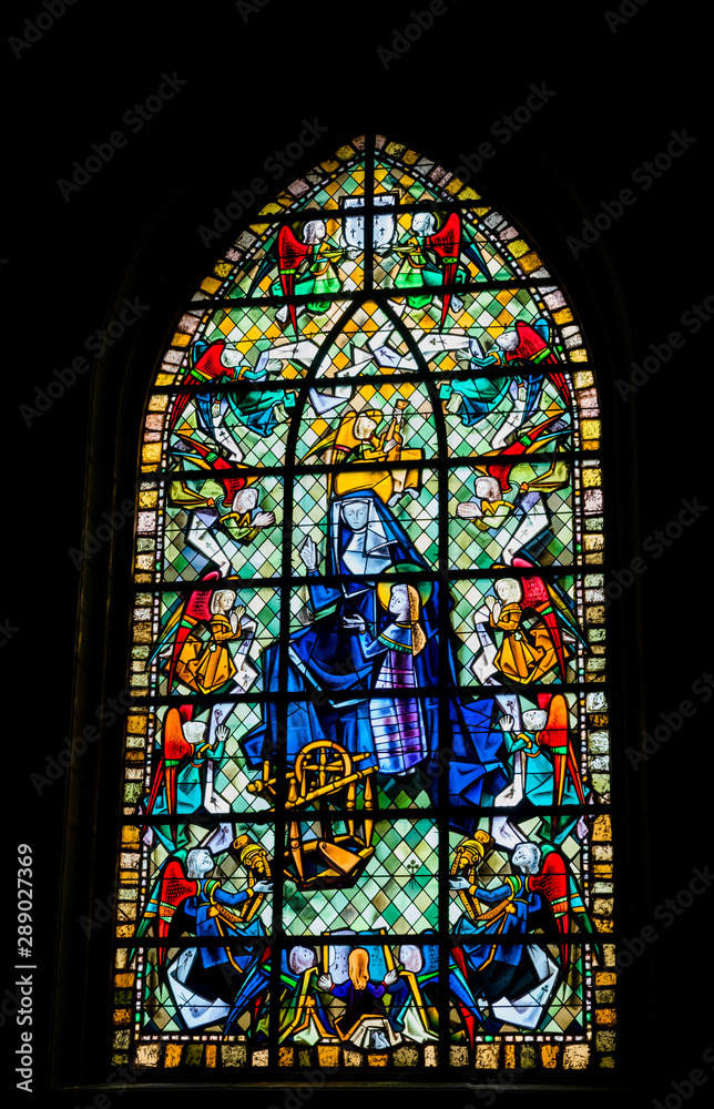 A detailed view of stained glass windows in the church of Saint Germain in Rennes in France
