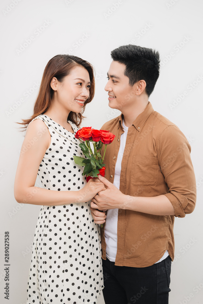 Portrait of cheerful lovely cute couple with beaming smiles hugging and looking to each other, Portrait of cheerful lovely cute couple with beaming smiles hugging and looking to each other,