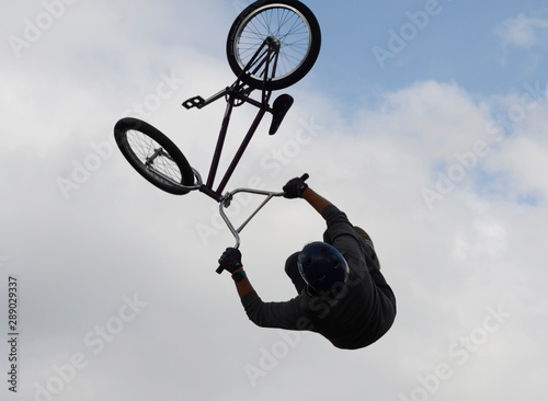 Performance of stunt cyclists at the celebration of City Day in Chelyabinsk.