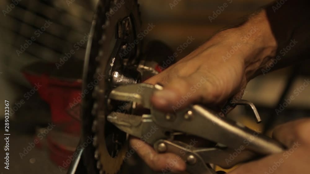 Man repair bicycle gear - handmade. video Man repair bicycle gear - handmade. video