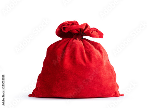 Santa Claus's red bag full with gift, isolated on white background. File contains a path to isolation.