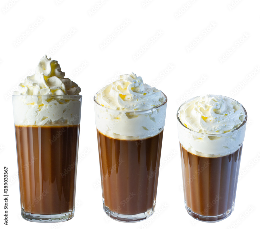 Cappuccino coffee with whipped cream in a tall glass. Isolate on a white background. The photo. Cappuccino coffee with whipped cream in a tall glass. Isolate on a white background. The photo.