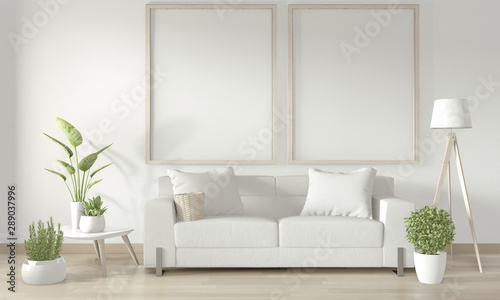 Mock up poster frame in white living room with white sofa and decoration plants on floor wooden.3D rendering © Interior Design