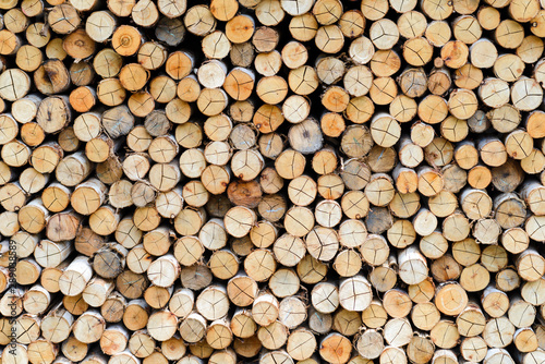 wall firewood - stacked of firewood prepare for the fireplace  barbecue  Background and texture