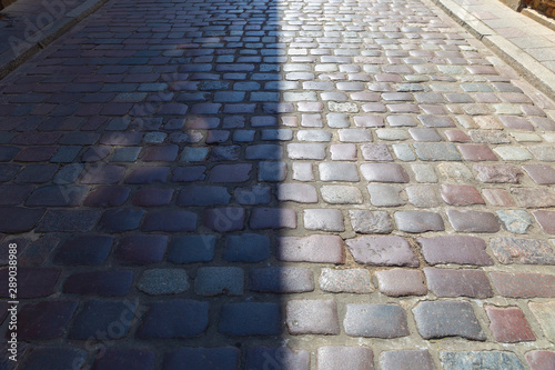 Paving stones laid out in the old town in Warsaw photo