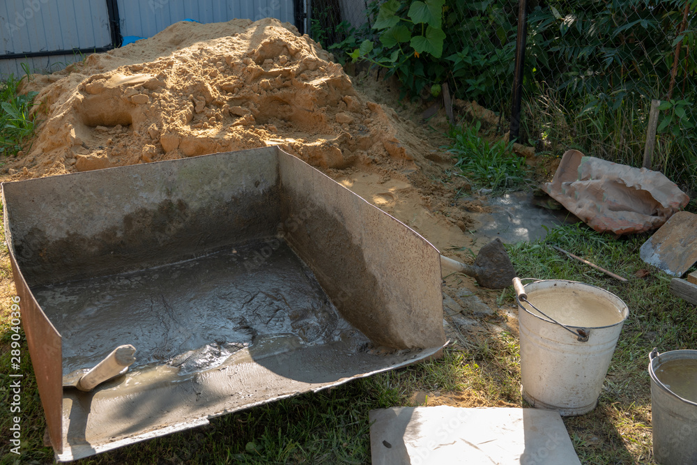 Mixing a cement in tank for applying construction. Mixing a cement in tank for applying construction.