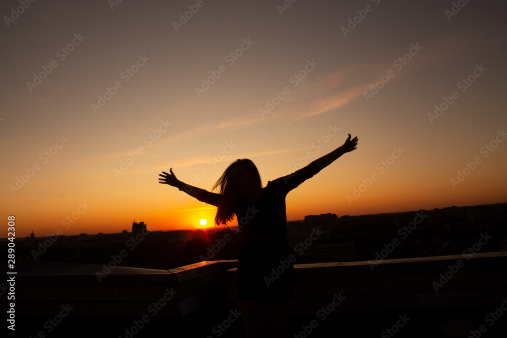 Girl Dancing at Sunset