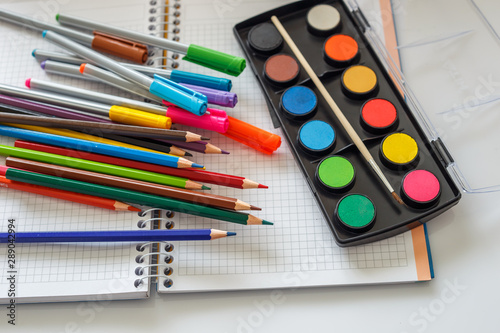 School education concept, stationery supplies and crayons