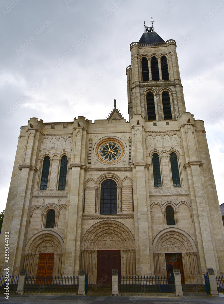 Basilica of Saint Denis, west facade on a rainy day. Paris, France.