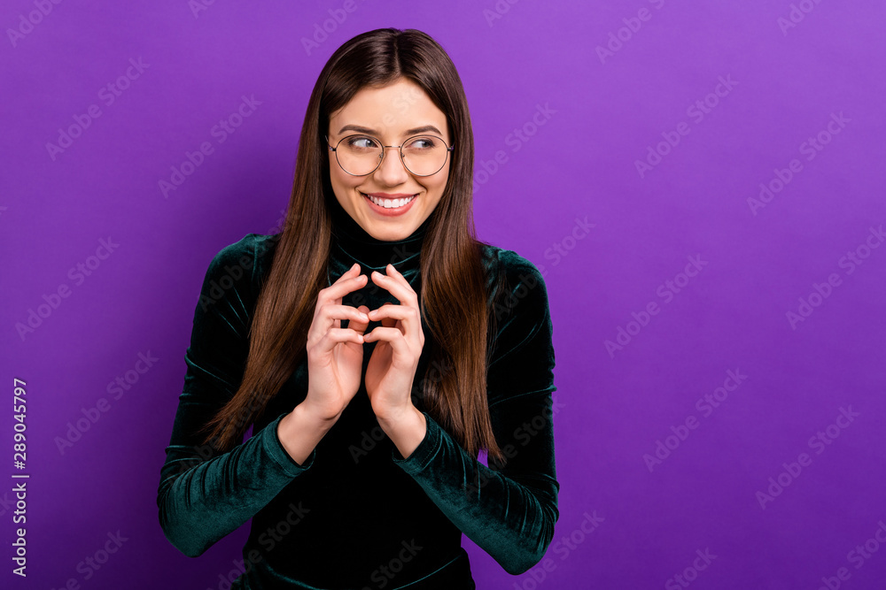 Portraitr of cute childish girl having thoughts having eyeglasses eyewear isolated over purple violet background Portraitr of cute childish girl having thoughts having eyeglasses eyewear isolated over purple violet background