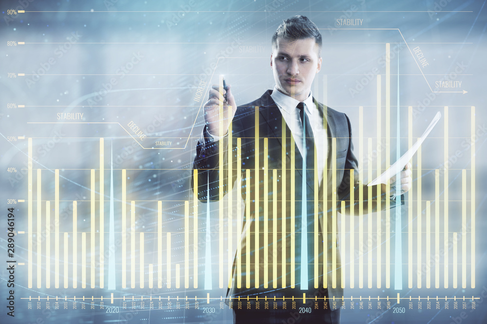 Businessman and forex graph hologram. Double exposure. Concept of financial education and analysis Businessman and forex graph hologram. Double exposure. Concept of financial education and analysis