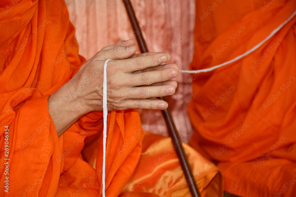 Obraz premium Monks' hands praying on ceremony of buddhist, Thailand