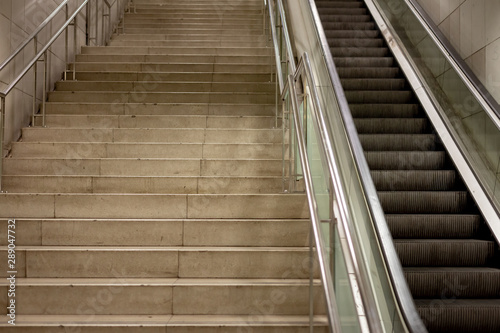 Фотография Mechanical or electric and normal stairways at the platform of subway