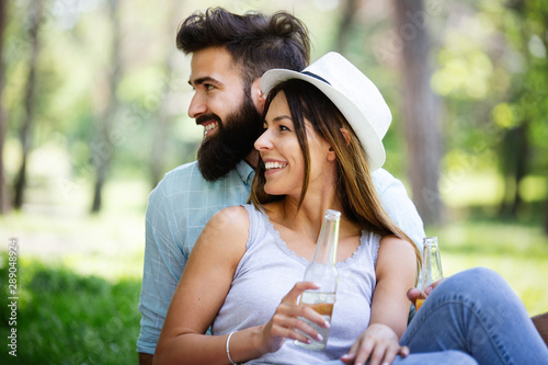 Couple in love enjoying picnic time outdoors