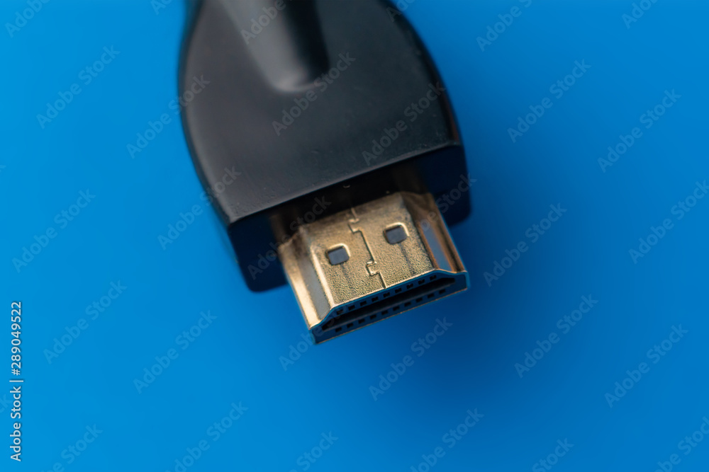 Fototapeta premium macro shot of the HDMI video cable on a color background