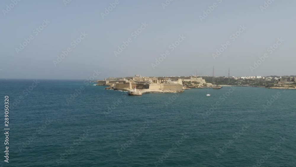 Long Shot Of Fort Ricasoli In Sunny Weather, Kalkara, Malta Long Shot Of Fort Ricasoli In Sunny Weather, Kalkara, Malta