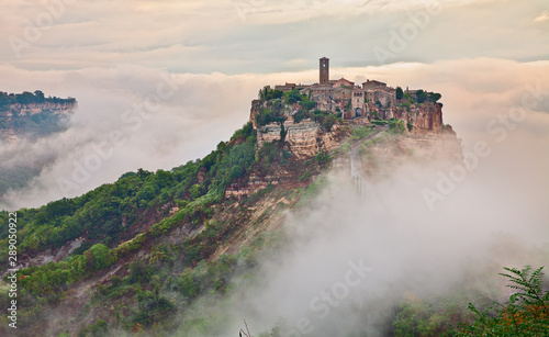 Civita di Bagnoregio, Viterbo, Lazio, Italy: landscape at dawn with fog photo