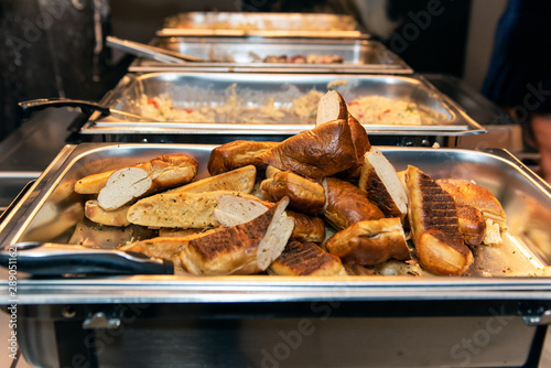 Pile of buttered garlic bread ready to serve to your plate from the buffet.