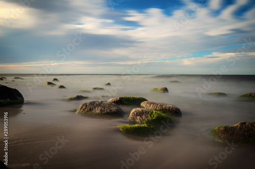 Fototapeta Naklejka Na Ścianę i Meble -  Stones on the shores of the Baltic Sea, long exposure.