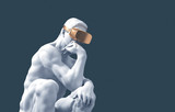 Sculpture Thinker With Golden VR Glasses On Blue Background