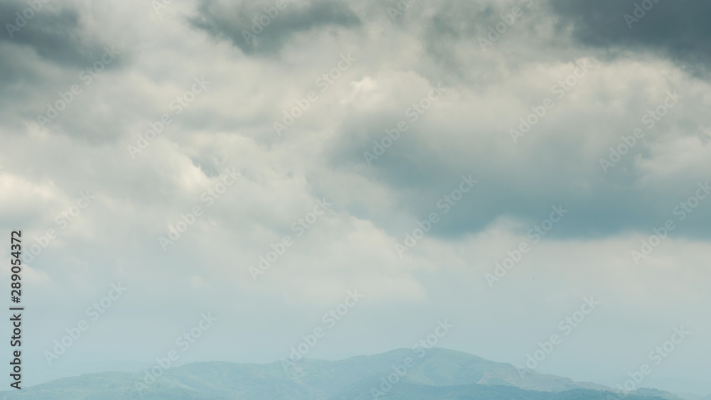 Picturesque stormy clouds movement over the mountains. Picturesque stormy clouds movement over the mountains.