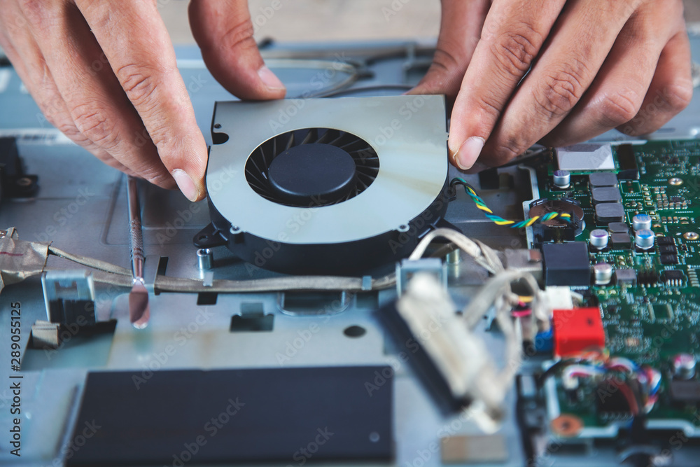 Obraz premium man repair computer