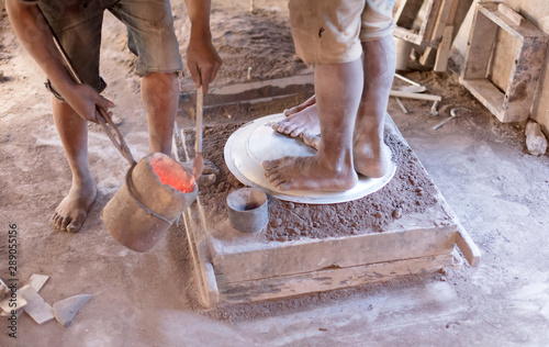 Manufacturing of aluminum kitchen utensils, working with salvaged materials photo