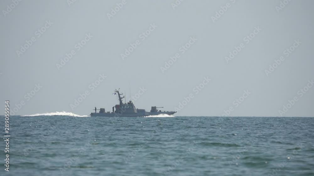 Military patrol ship in the Black Sea. Slow motion Military patrol ship in the Black Sea. Slow motion