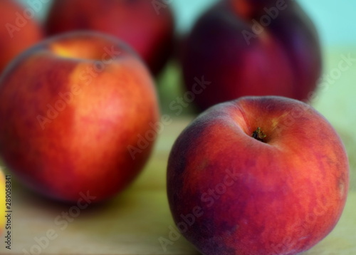 red peaches on a background