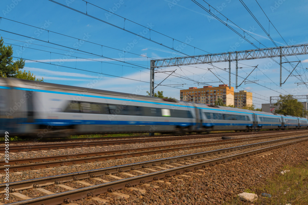 Fototapeta premium Speeding Train on suburban rails