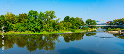 Tableau sur toile Blue metal bridge with rat, over river Weser. Hameln, Germany