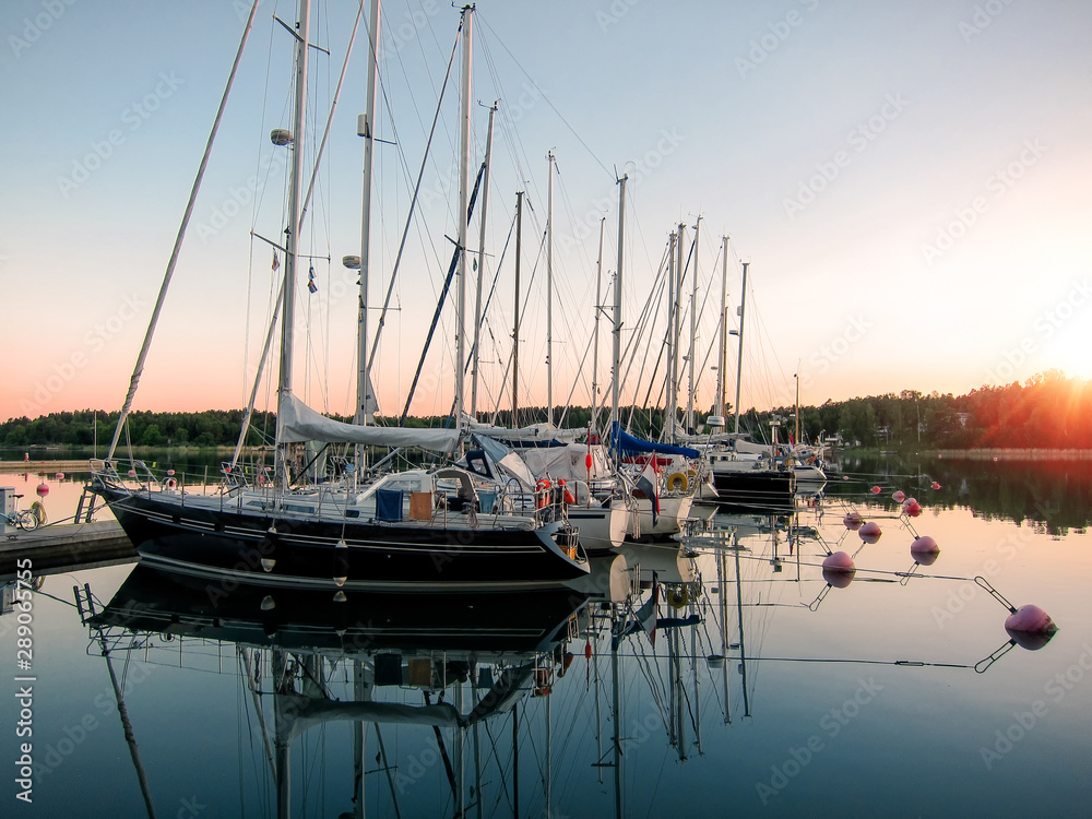 Small boat marina in warm summer evening at Aland, Finland. 