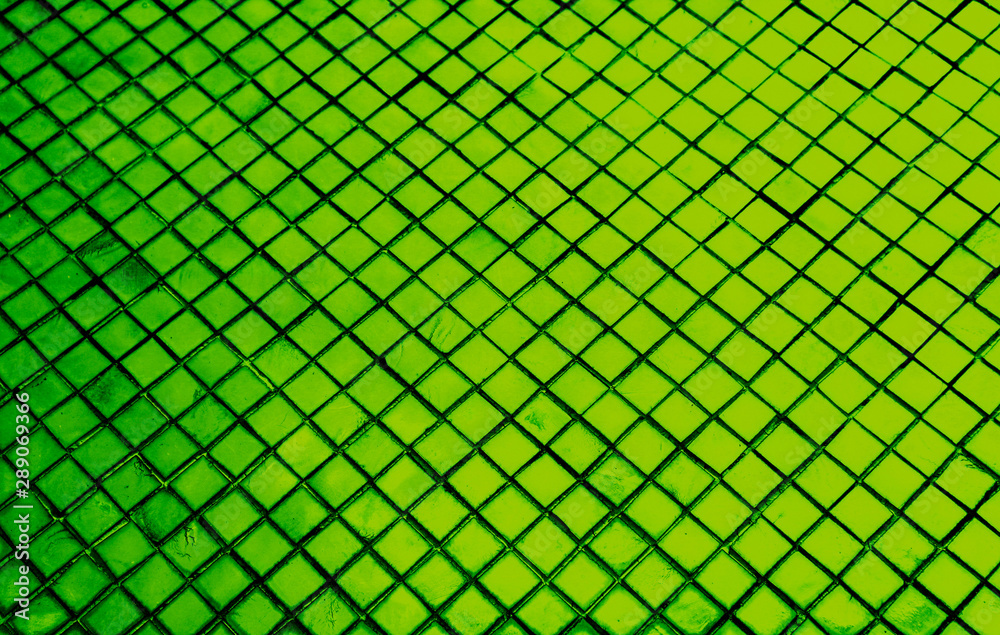 Fototapeta premium Beautiful closeup textures abstract color dark black white and light green tiles granite and light green glass pattern wall and background and art