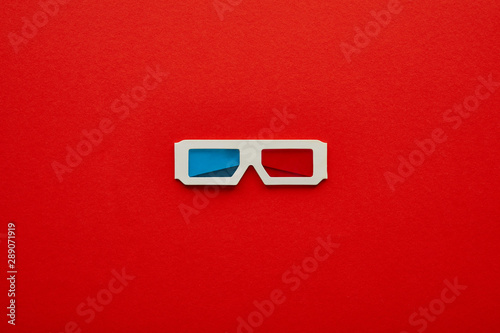 Photography top view of 3d glasses on red background