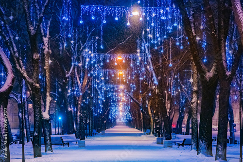 The street is decorated for Christmas. Deserted street with garlands. New year in Russia. Christmas city decorations. Fantastic beauty. Sense of celebration. Festive illumination