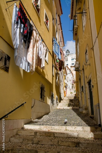 narrow street in lisbon portugal © Ivan