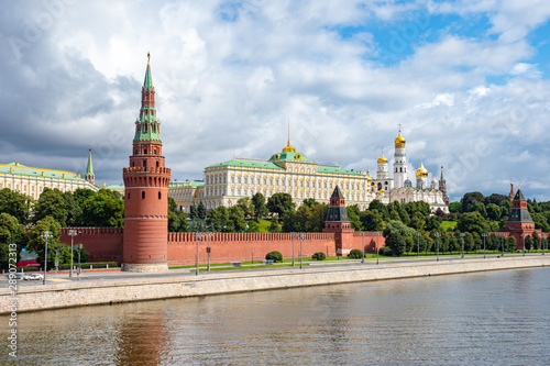 View of Moscow on a summer day. Capital of Russia. Grand Kremlin palace. Church Of The Kremlin. Kremlin embankment. River Moscow. Business card of Moscow. Summer trip to the Russian capital.