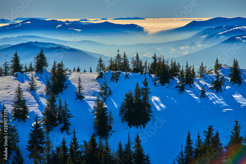 Aerial Landscape view from Ceahlău Mountains National Park at sunset in winter season,Sunset in Ceahlau Mountains