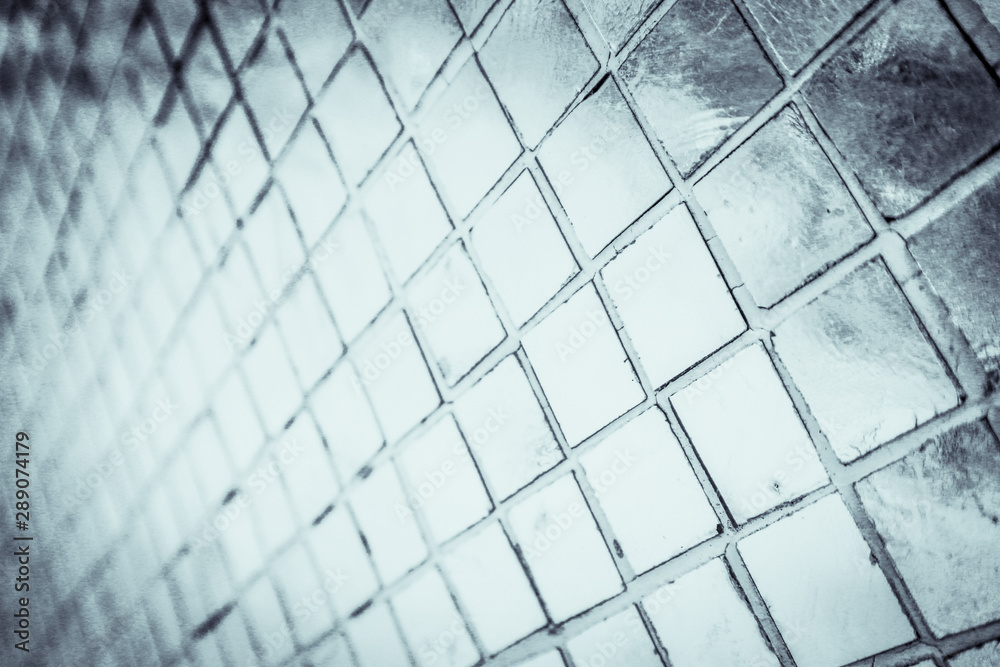 Beautiful closeup textures abstract color black and white tiles granite and light blue glass pattern wall and background and art Beautiful closeup textures abstract color black and white tiles granite and light blue glass pattern wall and background and art