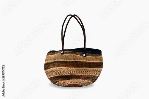 African sisal handmade basket (Kiondo) with Leather Straps isolated on white background