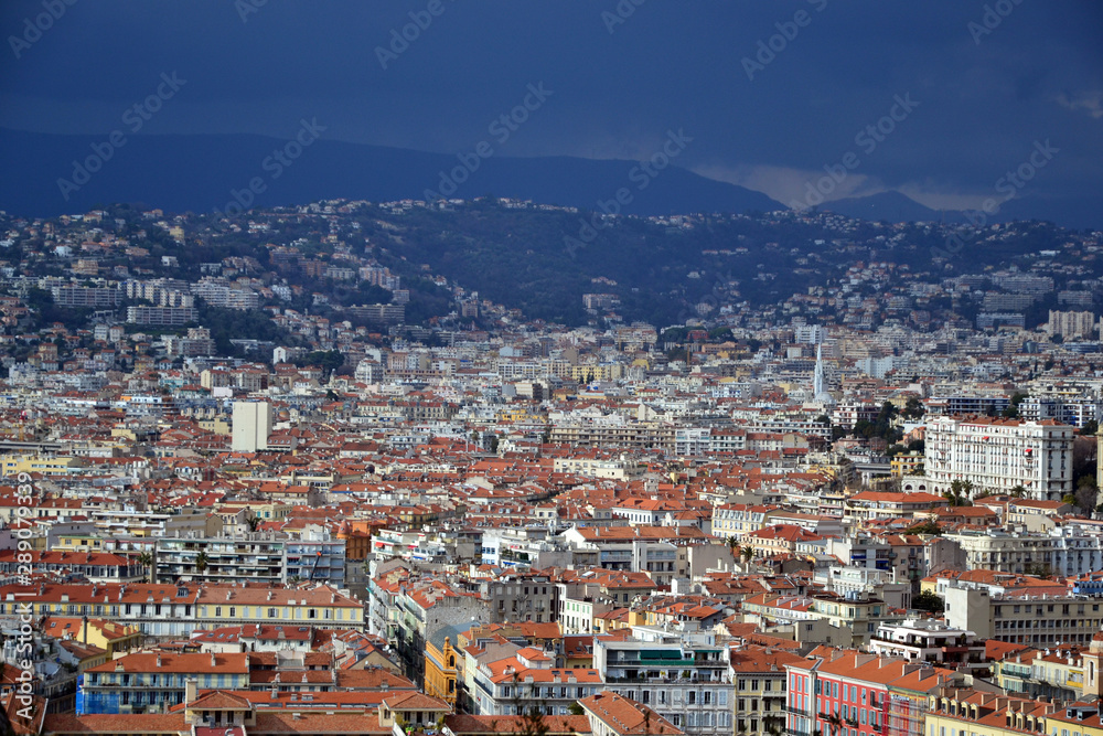 Nice, France - february 11th 2018 : cityscape of Nice during a thunderstorm with impressive clouds
