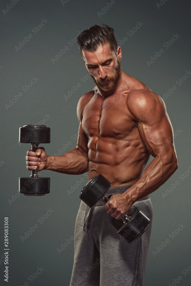 Muscular Men Doing Exercise For Bicep