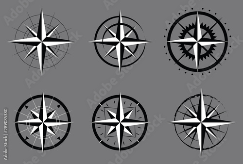 Collection of logos of the compass. Stylized sea compasses with a wind rose. Measuring device. Black and white vector logo. Tattoo.