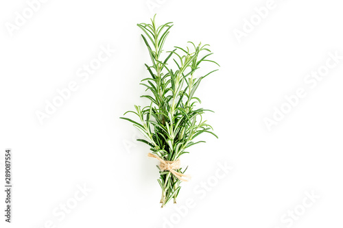 Green bundle of rosemary isolated on a white background. Мedicinal herbs. Flat lay. Top view