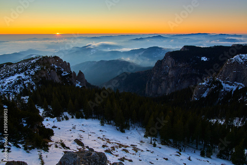 Aerial Landscape view from Ceahlău Mountains National Park at sunset in winter season,Sunset in Ceahlau Mountains